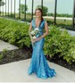 Trumpet/Mermaid V-neck Sequined Sweep Train Prom Dresses