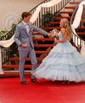 Ball Gown/Princess V-neck Tulle Glitter Sweep Train Prom Dresses With Tiered